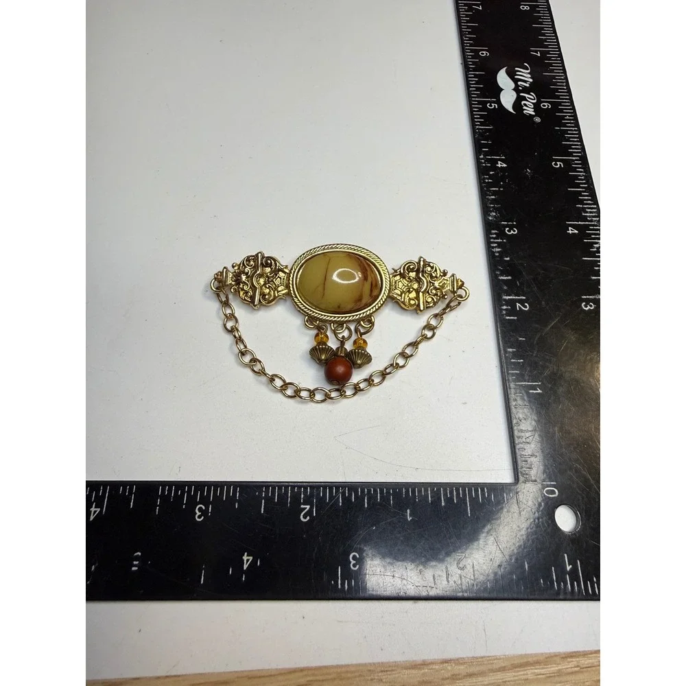 Unbranded ornate gold